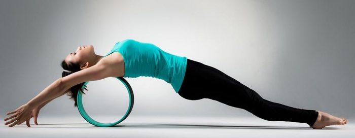 girl on yoga wheel